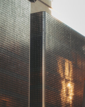 View of the Maison Hermès Store windows hit by sunlight, Ginza, Tokyo, Japan.