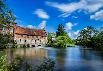 Old Mill and river with countryside, United Kingdom