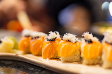 Salmon sushi roll in Japanese restaurant