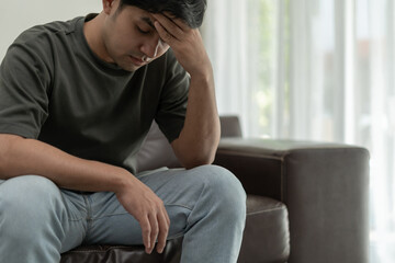 Depression and mental illness. Asian man disappoint, sad after receive bad news. Stressed boy...