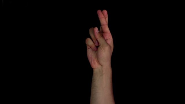 R r alphabet American sign language video demonstration in HD, American Sign Language (ASL) single-handed R r  letter sign isolated on black background.

