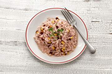 Risotto with burgundy color sweet corn
