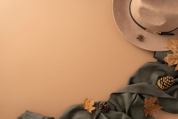 Autumn-inspired stylish female ensemble idea. Top view of wide-brimmed hat, elegant charcoal gray...