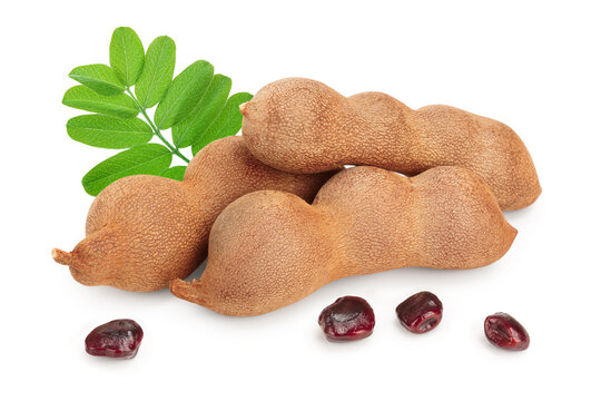 Tamarind fruit with leaf isolated on white background