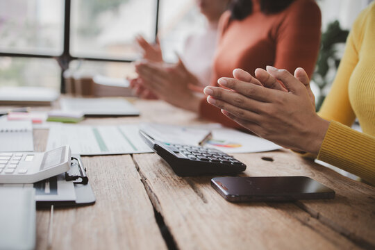 Group businessman attended a meeting with executives of startup companies, startup company sales team meetings, brainstorming and summary of company performance. Business strategy management concept.