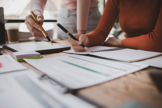 Group businessman attended a meeting with executives of startup companies, startup company sales team meetings, brainstorming and summary of company performance. Business strategy management concept.