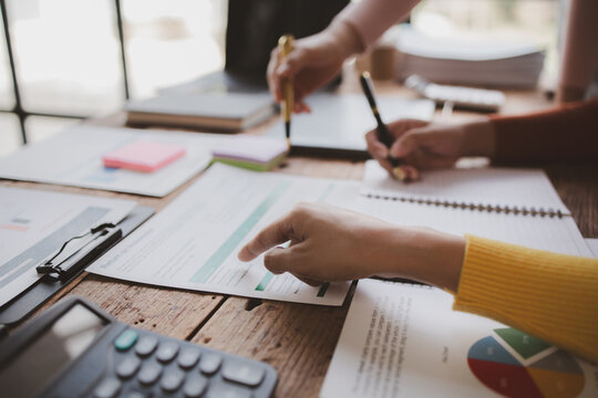 Group businessman attended a meeting with executives of startup companies, startup company sales team meetings, brainstorming and summary of company performance. Business strategy management concept.