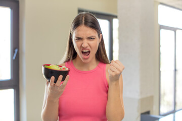 young pretty woman looking angry, annoyed and frustrated. japanese ramen concept