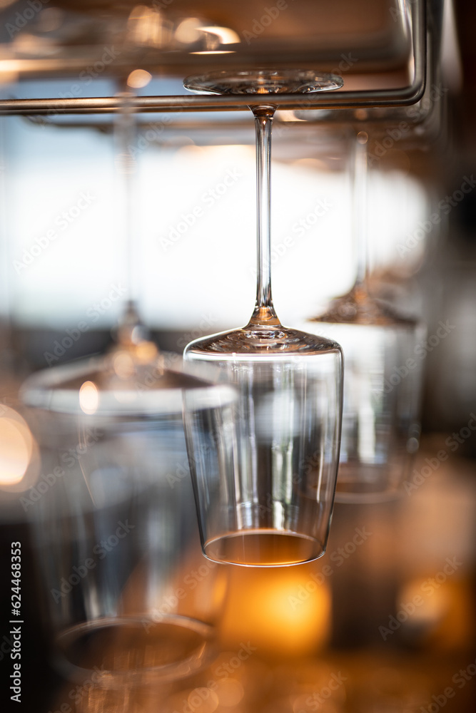 Wall mural empty clean glass glasses for alcoholic drinks in a restaurant on a bar counter