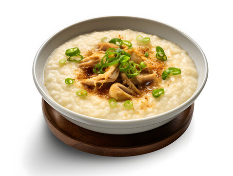Bubur ayam or chicken congee is Indonesian rice porridge topped with shredded chicken and various savoury condiments on isolated white background