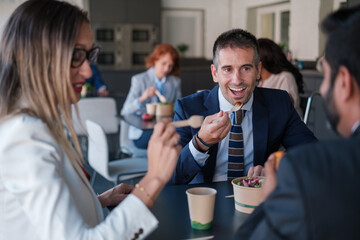 Workers in the break hour eating in the authorized areas of the company. Concept: business, entrepreneurs, break