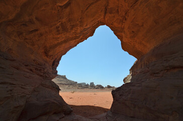 Rock formation with an erosive window in the Sahara desert, Algeria