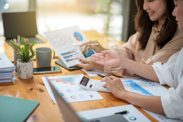 Two colleague businesswoman discussion and brainstorming business ideas. Consulting and marketing planning
