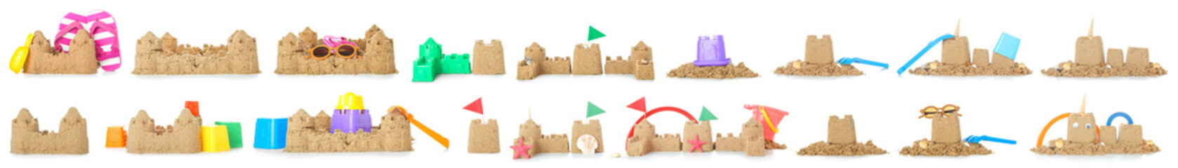 Set of many castles made of sand on white background