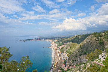 Obraz premium View of the blue sea from Taormina towards the bay in Giardini Naxos, Sicily, Italy