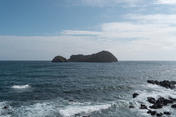 Vila Franca do Campo with view over island. 