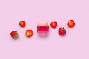 Composition with jar of cosmetic product and ripe strawberry on color background