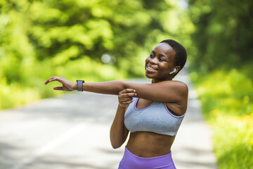 Exercise, fitness and black woman stretching arm outdoors for health and wellness. Thinking, sports...