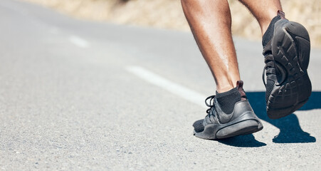Man, fitness and running shoes on road for exercise, cardio workout or training on asphalt...