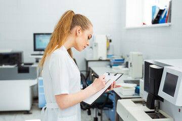 Medical Research Laboratory: Portrait of Female Scientist Using Computer to Analyse Data. Advanced Scientific Lab for Medicine, Biotechnology, Microbiology Development