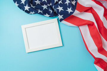 Happy Labor day celebration concept with frame mock up and USA flag on blue background. Top view, flat lay