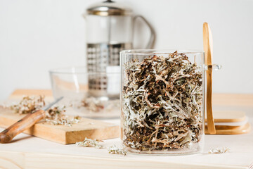 Dry icelandic moss in a glass jar.
