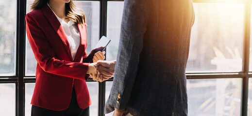 Business handshake for teamwork of business merger and acquisition,successful negotiate,hand...