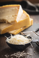 Tasty parmesan cheese. Grated cheese.