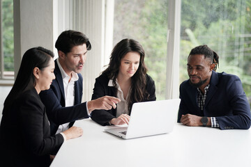 Business discussions. Shot of businesswomen brainstorming in an office.. young people group in modern office have team meeting and brainstorming