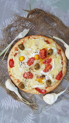 pizza mit knobi und wachtelei extremo