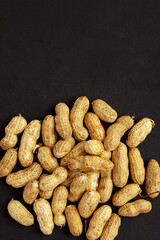 Roasted peanuts, peanuts in shell Isolated on black background
