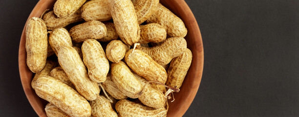 Roasted peanuts, peanuts in shell Isolated on black background