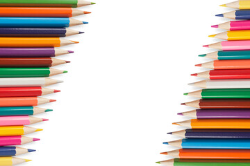 Colored pencils frame isolated on white background. Study, drawing, creativity concept. Children's colorful background with copy space