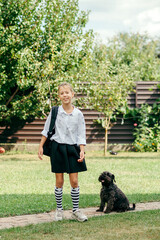 Back to school. Cute child girl with backpack going to school with fun