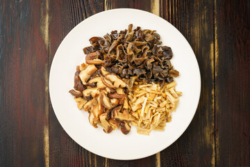 Various dried mountain delicacies on a monochrome background
