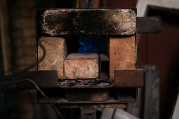 Homemade small stove in the blacksmith's workshop