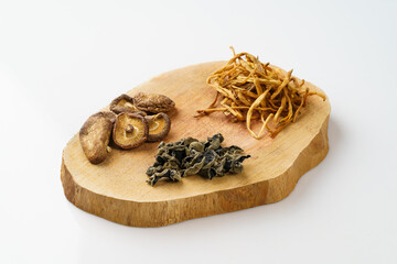 Various dried mountain delicacies on a monochrome background