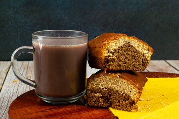 Two pieces of mixed cake and a mug of hot chocolate
