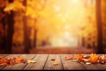 Naklejka na ściany i meble Wood planks with copy space and blurred autumn.
