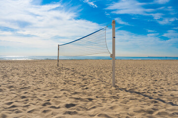 Beach volleyball court with blue summer sky