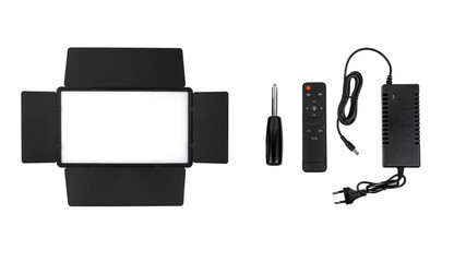 Photo and video lamp isolate on white back. LED lamp with special shutters for the formation of light flux. Photo and video lighting fixture.