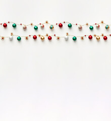 Christmas border with baubles garden. Space for text.