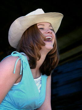 Cowgirl Laughs With Real Mirth