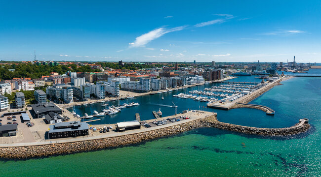 View of the Helsinborg city centre and the port of Helsingborg in Sweden. Old town by the beach and city port in Helsingborg harbour. Beautiful aerial view.