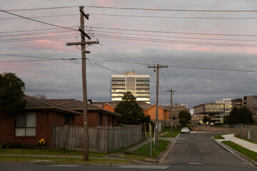 The proud and towering dandenong australian tax office building overseeing industrial suburbs.