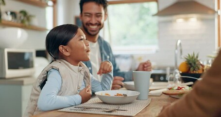 Parents, children and a girl eating spaghetti with her family in the dining room of their home together for supper. Food, kids and father around a table for a meal, bonding over dinner in a house - Powered by Adobe