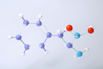 Molecule of phenylalanine on white background. Chemical model