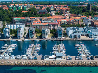 View of the Helsinborg city centre and the port of Helsingborg in Sweden. Old town by the beach and city port in Helsingborg harbour. Beautiful aerial view.