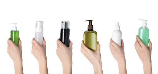 Face and body wash. Women holding bottles of different cosmetic products on white background,...