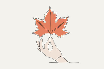 Colored illustration of a hand holding autumn leaves. Autumn one-line drawing